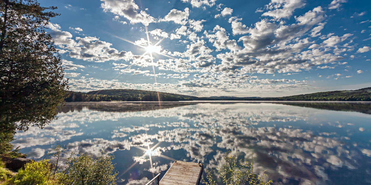 sunrise reflection lake of two rivers